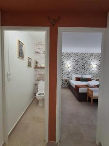 a bedroom with a bed and a toilet in a room at Ch'ti Camargue in Port-Saint-Louis-du-Rhône +20 photos