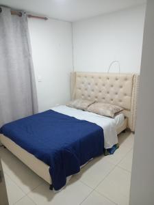 Кровать или кровати в номере Casa Turistica Andy en el Eje Cafetero