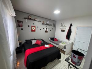 Ένα ή περισσότερα κρεβάτια σε δωμάτιο στο Suíte Harry Potter - Pousada Castelo do Luar +22 φωτογραφίες