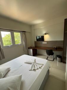 Postel nebo postele na pokoji v ubytování Hotel Boa Vista - 200mts do Shopping Pátio