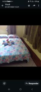 Ένα ή περισσότερα κρεβάτια σε δωμάτιο στο Jadypeba