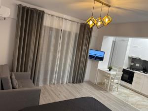 Μια τηλεόραση ή/και κέντρο ψυχαγωγίας στο Win 68Studio