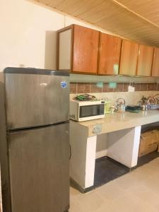 Η κουζίνα ή μικρή κουζίνα στο The Moon Star Vila +8 φωτογραφίες