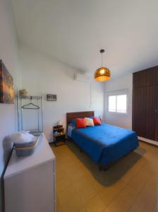 Ένα ή περισσότερα κρεβάτια σε δωμάτιο στο Suíte de Charme, Paz e Natureza a Passos do Mar em Ipioca