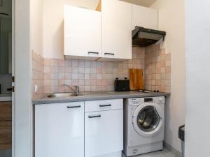 Kuchyň nebo kuchyňský kout v ubytování Town House 2 + 19 fotografií