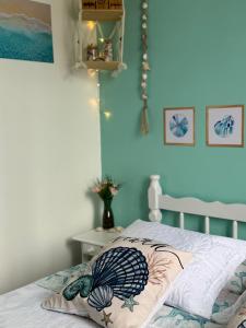 Ένα ή περισσότερα κρεβάτια σε δωμάτιο στο Suíte Maresia - Pousada Castelo do Luar +26 φωτογραφίες