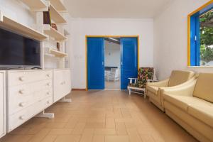 Et tv og/eller underholdning på Casa Praia do Forte