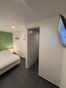 Ένα ή περισσότερα κρεβάτια σε δωμάτιο στο Casa Nalya +1 φωτογραφίες