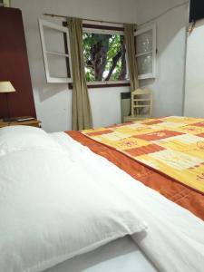 Ένα ή περισσότερα κρεβάτια σε δωμάτιο στο Hosteria Champaqui