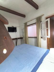 Ένα ή περισσότερα κρεβάτια σε δωμάτιο στο Hosteria Champaqui