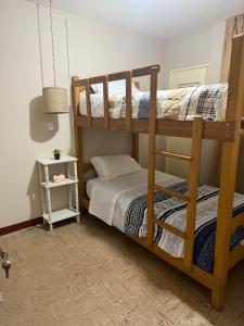 a bedroom with two bunk beds and a bed at Apartment in Lima's historic center in Lima