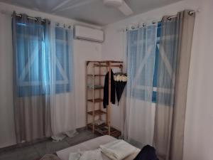 En eller flere senge i et værelse på Villa Creole971