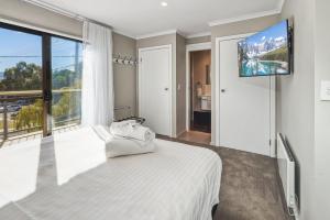 Ένα ή περισσότερα κρεβάτια σε δωμάτιο στο Albi Celeste - 2 of 9 Park Road