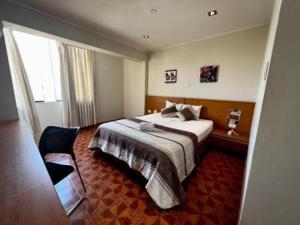 Ένα ή περισσότερα κρεβάτια σε δωμάτιο στο Apartamento vista hermosa