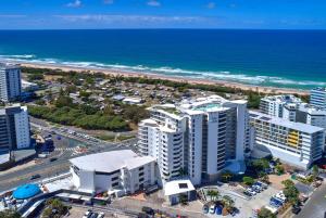 an aerial view of a city and the ocean at Poolside Bliss in Maroochydore