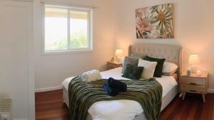 Ένα ή περισσότερα κρεβάτια σε δωμάτιο στο River Cottage Retreat Jalbarragup