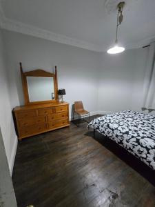 En eller flere senge i et værelse på 2 Nottingham Way Glenalta