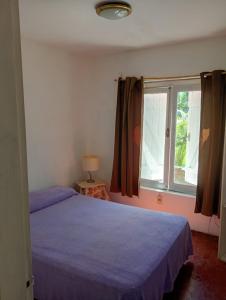 Postel nebo postele na pokoji v ubytování Casa con pileta