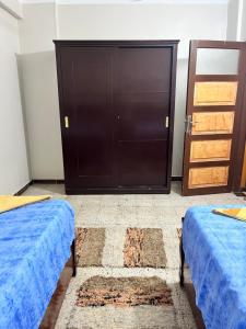 Ένα ή περισσότερα κρεβάτια σε δωμάτιο στο NUB Guest House