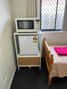 Φωτογραφία από το άλμπουμ του Private Room with shared bathroom σε Browns Plains