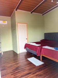 Postel nebo postele na pokoji v ubytování cabinas lalis playa blanca