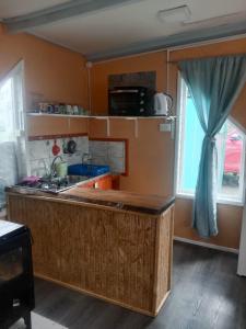 Η κουζίνα ή μικρή κουζίνα στο Cabaña Liam Emilio