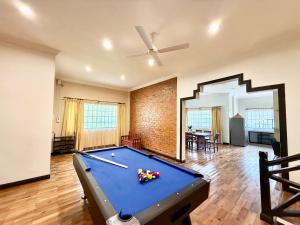 a living room with a pool table in it at Deco Home The Oasis Mesilau at Kundasang in Kundasang