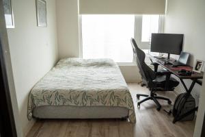 Кровать или кровати в номере Exclusivo departamento con vista al mar