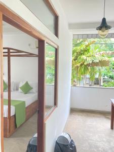 Ένα ή περισσότερα κρεβάτια σε δωμάτιο στο Mealanie's House