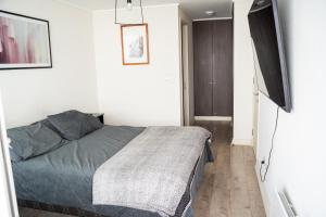 Кровать или кровати в номере Exclusivo departamento con vista al mar