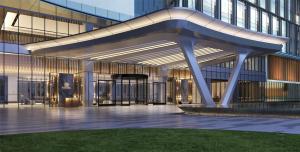 een blik op de ingang van een gebouw bij Hilton Shaoxing Hotel And Residences in Shaoxing