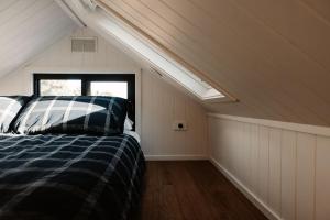 Ένα ή περισσότερα κρεβάτια σε δωμάτιο στο Tiny Isabella