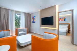 TV/trung tâm giải trí tại Hilton Garden Inn Bengaluru Whitefield