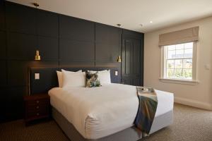 Postel nebo postele na pokoji v ubytování The Clements Hotel + 56 fotografií