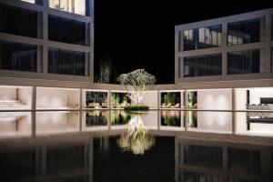 Bazén v ubytování The UECHAO Hotel Riyuebay nebo v jeho okolí + 87 fotografií