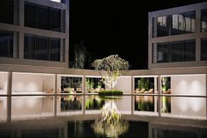 Zahrada ubytování The UECHAO Hotel Riyuebay