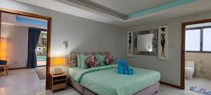 En eller flere senge i et værelse på Villa Summer - Private villa by the sea + 90 billeder