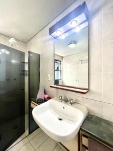 Et badeværelse på Palladium Prime Stay