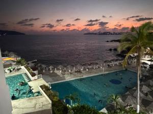 Бассейн в Suite VIP frente al mar en el corazón de Acapulco или поблизости