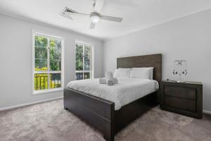 Ένα ή περισσότερα κρεβάτια σε δωμάτιο στο Exclusive Luxury Oasis Tumbi Umbi NSW