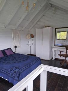 Giường trong phòng chung tại Cabaña en Punta Rubia beach, Rocha