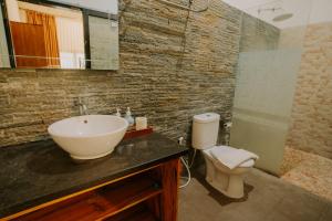 Ένα μπάνιο στο Mojosurf Red Island