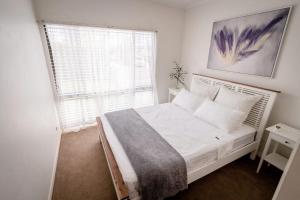 Ένα ή περισσότερα κρεβάτια σε δωμάτιο στο The Emerald Bower