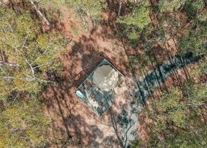 an overhead view of a house in the middle of a forest at Kookaburra Ridge in Wyee