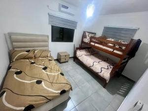 Ένα ή περισσότερα κρεβάτια σε δωμάτιο στο Ponta Rest House +11 φωτογραφίες