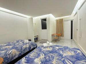 Ένα ή περισσότερα κρεβάτια σε δωμάτιο στο Hacienda Xancalle