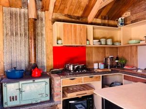 Køkken eller tekøkken på Bay of Islands - Olive Grove Cottage + 70 billeder