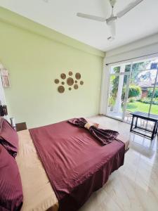 Postel nebo postele na pokoji v ubytování Lost Paradise Sri Lanka