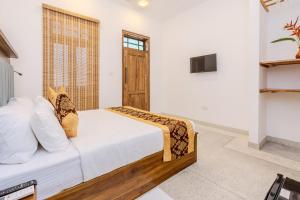 TV a/nebo společenská místnost v ubytování The Mansion Koggala