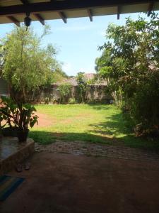 Un jardín fuera de Muthu Villa